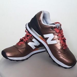 NEW BALANCE 574 SERIES LOW-TOP GOLD 'GOLD BLACK WHITE ORANGE' TRAINER